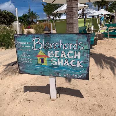Blanchards Beach Shack sign and outdoor seating in Anguilla