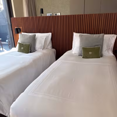 Modern twin bedroom with private balcony at Grand Hotel Victoria in Menaggio, Lake Como