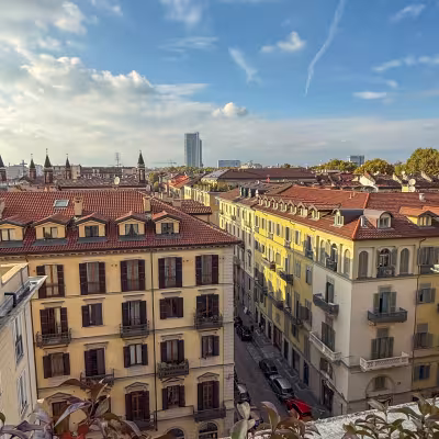 Rooftop view over historic buildings and skyline in Turin, Italy