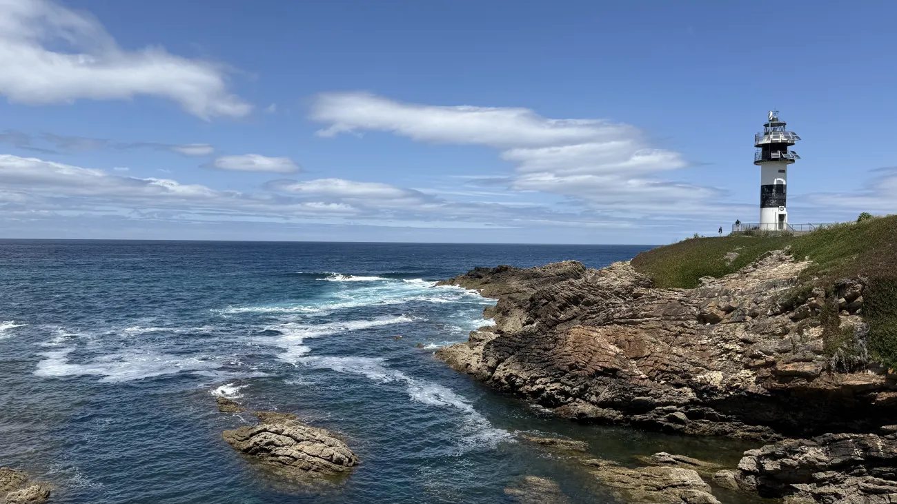 Isla Pancha lighthouse on rocky Atlantic coastline near Ribadeo in northern Galicia